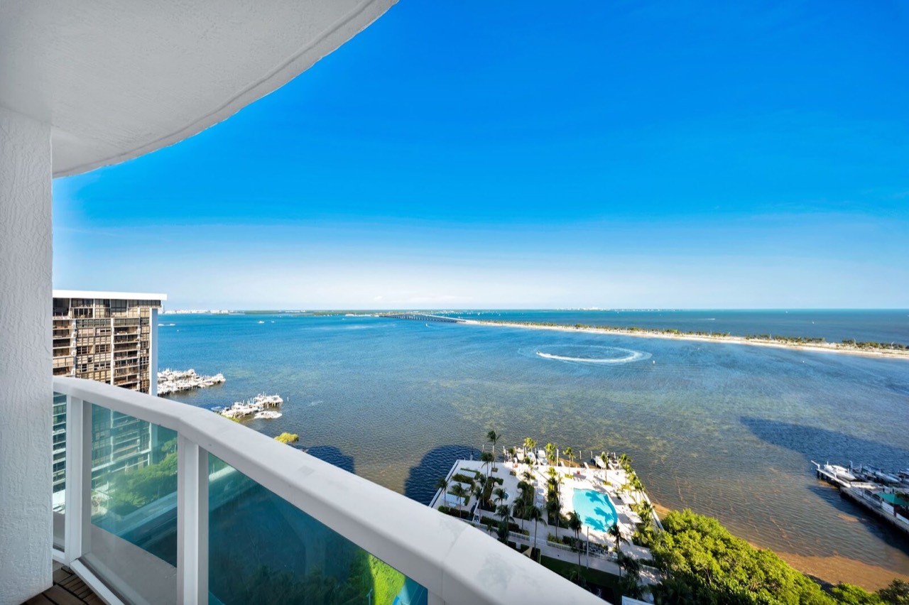 Private curved terrace overlooking Biscayne Bay at Skyline on Brickell, Residence 1907