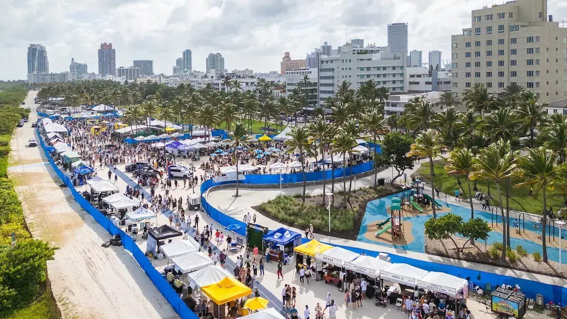 Aerial view of the South Beach Seafood Festival tents along the sand at Lummus Park